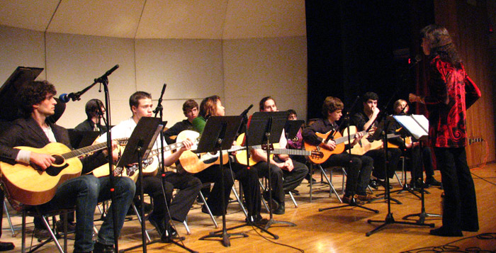 Guitar Instruction in Mineral Point WI. Helen directing Dutchess County Community Collage guitar consort.